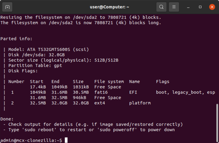 End of the mci restore output: the filesystem on /dev/sda2 is resized, the partition table shows an EFI and a platform partition, followed by Done